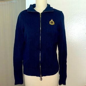 This cardigan used to fit me but I have grown out of it. I love this sweater.